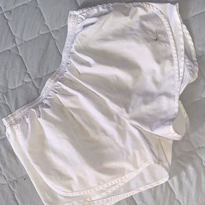White Nike shorts